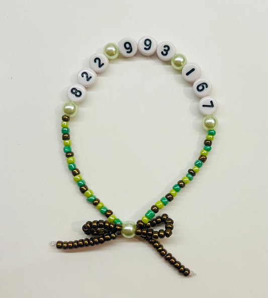 “822-993-167” She Calls Me Back Beaded Bow Bracelet