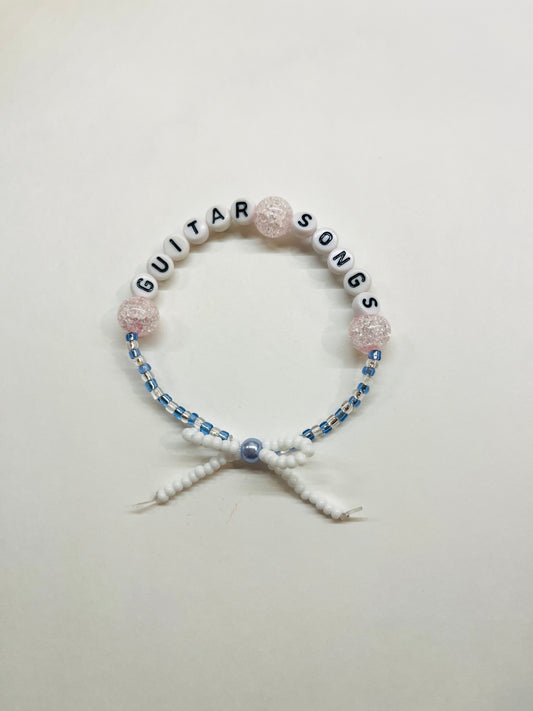 “Guitar Songs” Beaded Bow Bracelet