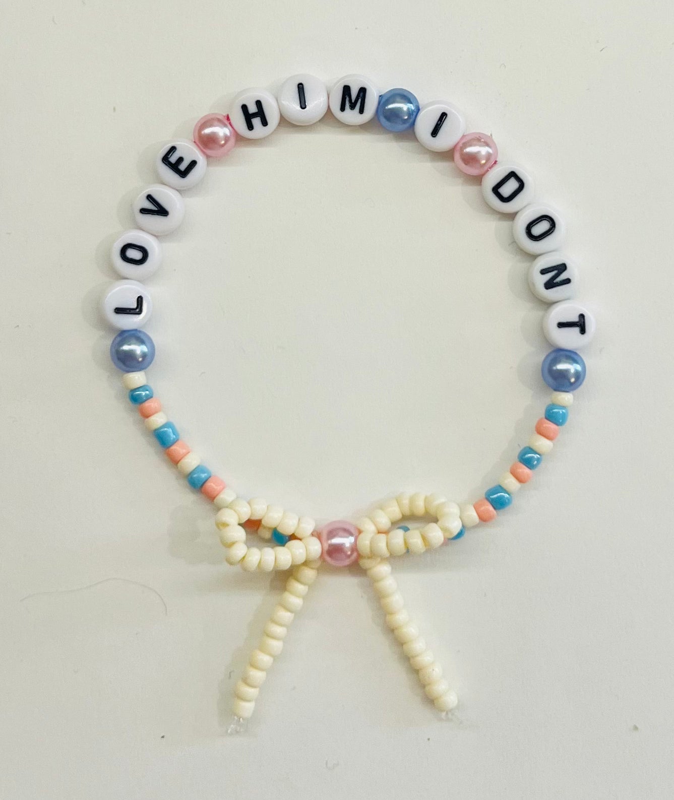 “Love Him I Don’t” Beaded Bow Bracelet